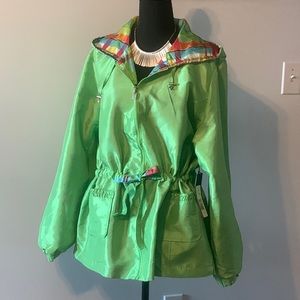 Reversible lime green windbreaker rain jacket.